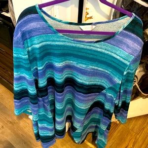 This winter weight tunic has a nice striped pattern. Size 3x